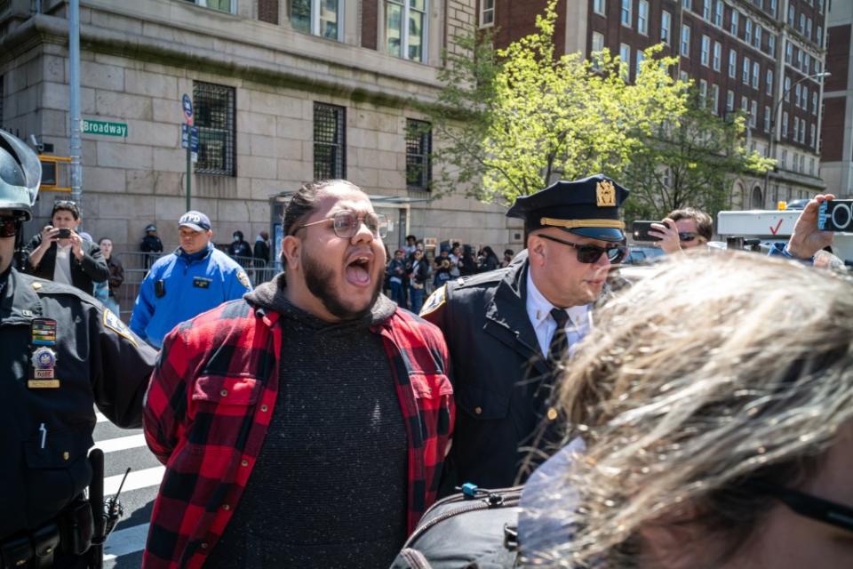 Brooklyn teaching assistant James Parra, who was cuffed and removed from a recent Columbia University protest, announced on social media last week that he was fired. ZUMAPRESS.com