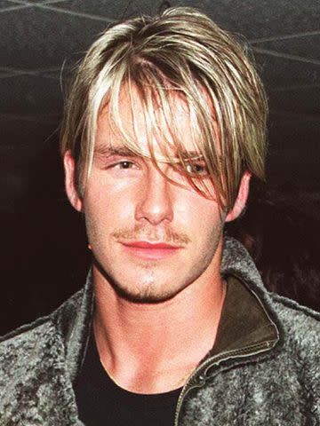 Dave Benett/Getty David Beckham backstage after a Whitney Houston concert in London.