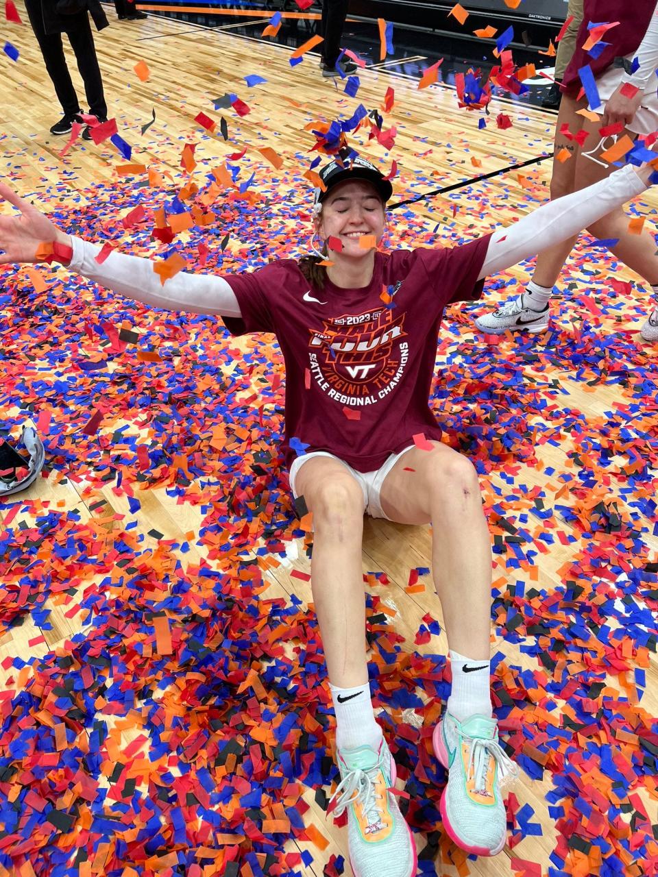 Taylor Geiman has overcome early-career knee injuries to play a reserve role for Virginia Tech in its NCAA Tournament run to the Final Four. Here, she celebrates on the floor after an Elite Eight win over Ohio State Monday, March 27, 2023.