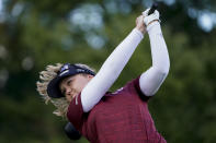 Brooke M. Henderson, of Canada, hits off the third tee in the first round of the Cognizant Founders Cup LPGA golf tournament, Thursday, Oct. 7, 2021, in West Caldwell, N.J. (AP Photo/John Minchillo)