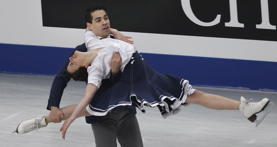 Anna Cappellini and Luca Lanotte of Italy perform during the ice dance short dance event of the World Figure Skating Championships in Saitama, near Tokyo, Friday, March 28, 2014. (AP Photo/Koji Sasahara)