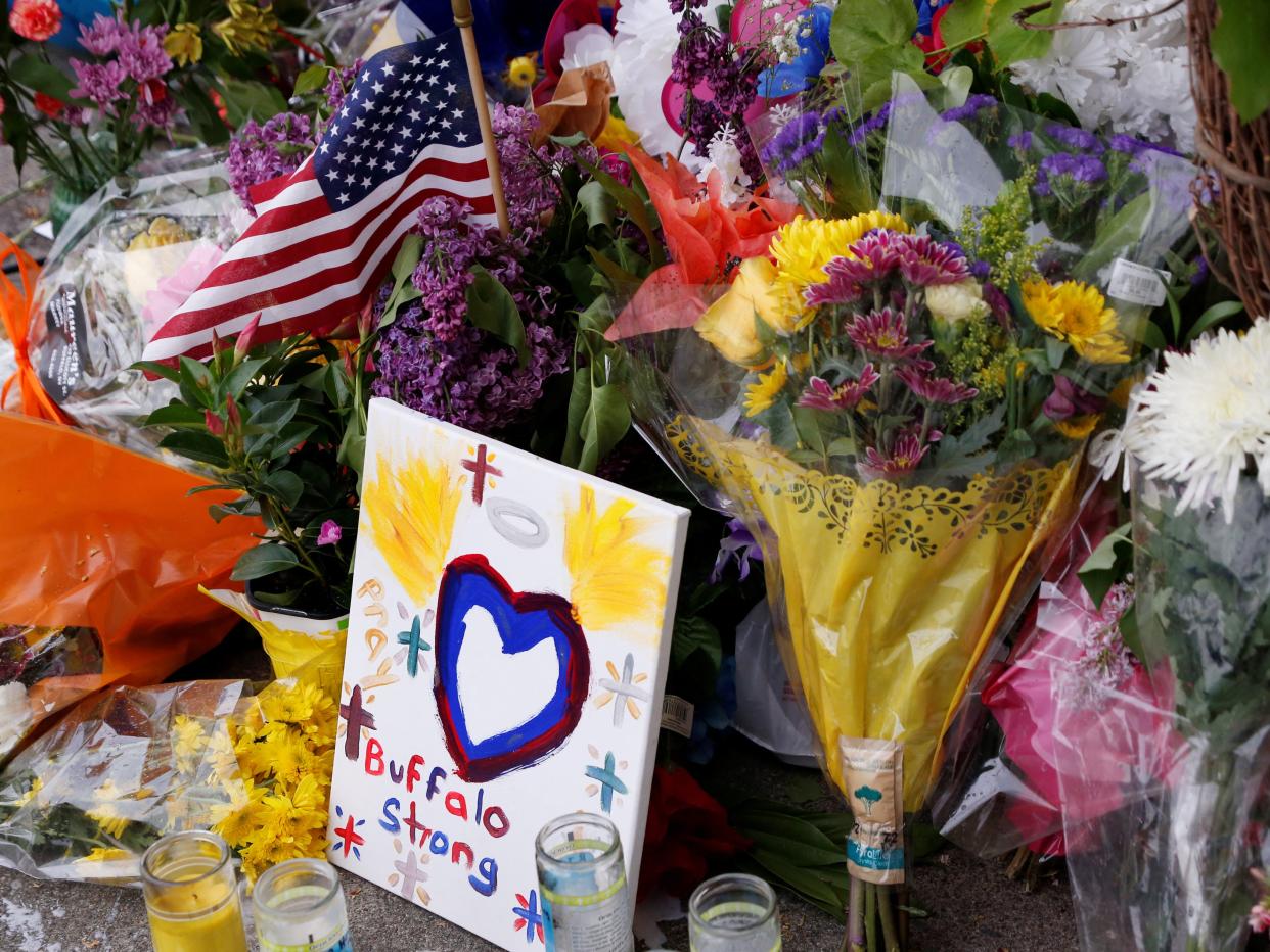 Flowers to commemorate victims of the Buffalo shooting.