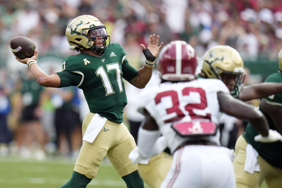 South Florida quarterback Byrum Brown (17) throws a pass against Alabama during the first half of an NCAA college football game Saturday, Sept. 16, 2023, in Tampa, Fla. (AP Photo/Chris O'Meara)