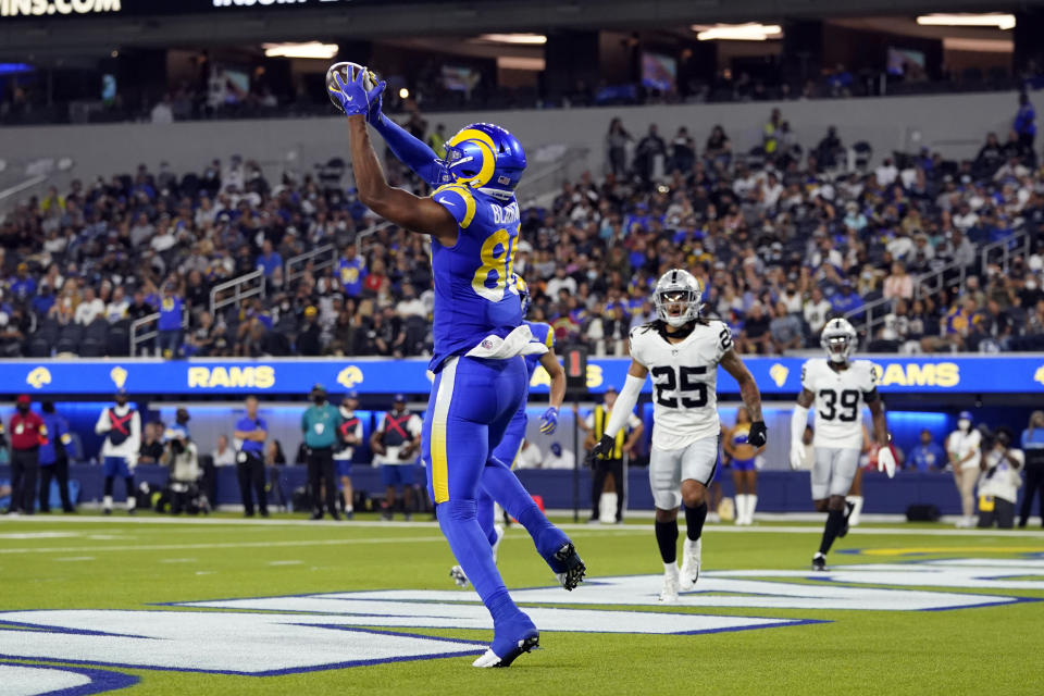 Los Angeles Rams tight end Kendall Blanton catches a touchdown pass during the first half of the team's preseason NFL football game against the Las Vegas Raiders on Saturday, Aug. 21, 2021, in Inglewood, Calif. (AP Photo/Ashley Landis)