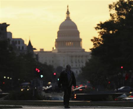 The United States Capitol dome is seen down Pennsylvania Avenue in Washington September 30, 2013. REUTERS/Gary Cameron