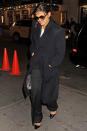 Katie Holmes: Katie Holmes is prepared for the cold New York City weather all bundled up in a long trench pea coat, wide-legged trousers, chic heels and a white top. In typical Hollywood style, she sports sunnies even at night. Picture by: Demis Maryannakis / Splash News