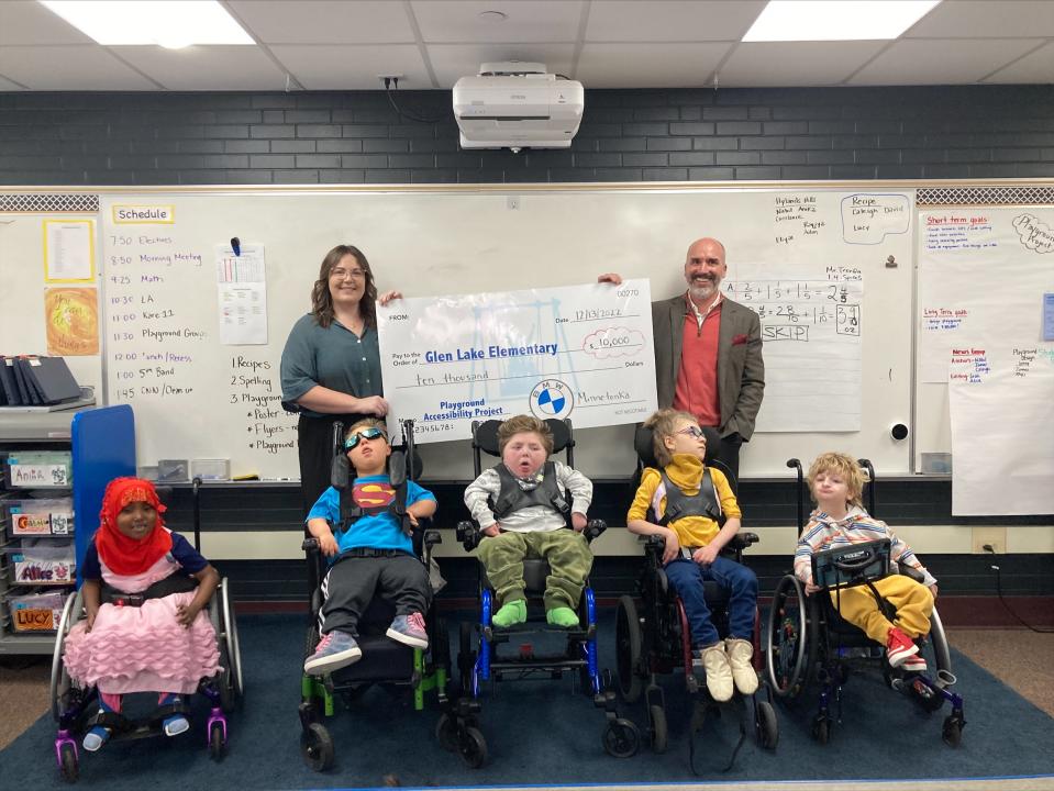 Students and staff at Glen Lake Elementary School. Teacher Betsy Julien kickstarted a fundraiser to make the school's playground more accessible for kids with wheelchairs and special needs. As of March 2023, the school has raised almost $700,000.