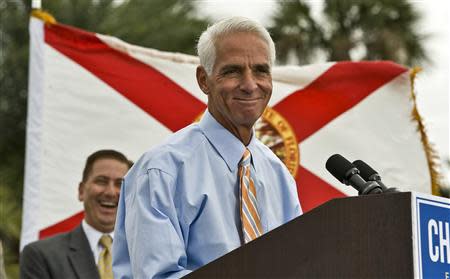 Former Republican Governor Charlie Crist addresses supporters in a waterfront park where he announced his Democratic candidacy for governor during a rally in St. Petersburg, Florida, November 4, 2013. REUTERS/Steve Nesius