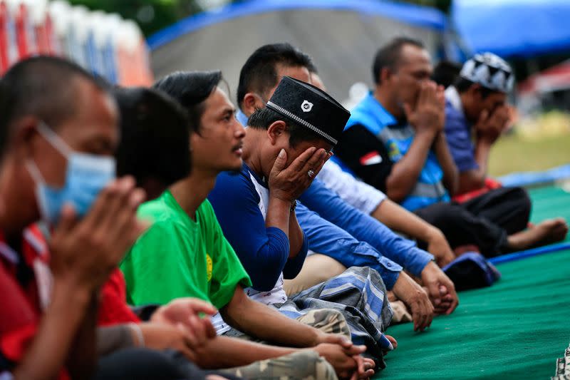 Friday prayers at a temporary shelter in Penanggal, Candipuro district, Lumajang