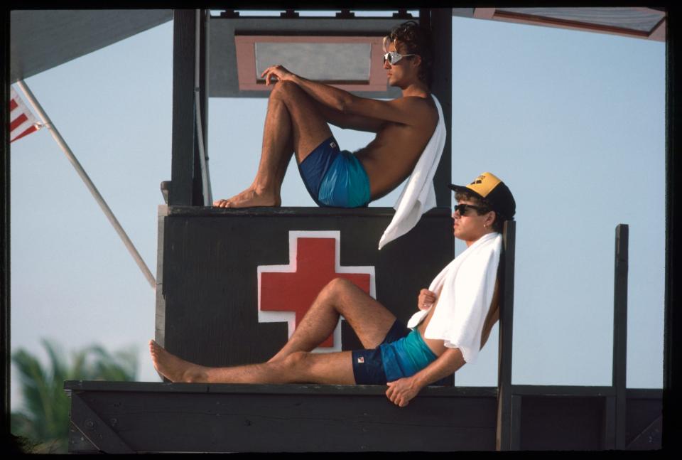 Andrew Ridgeley (top) and George Michael met in grade school in a small town in England. Their friendship endured even after Wham! separated in the mid-'80s for Michael to pursue a solo career.