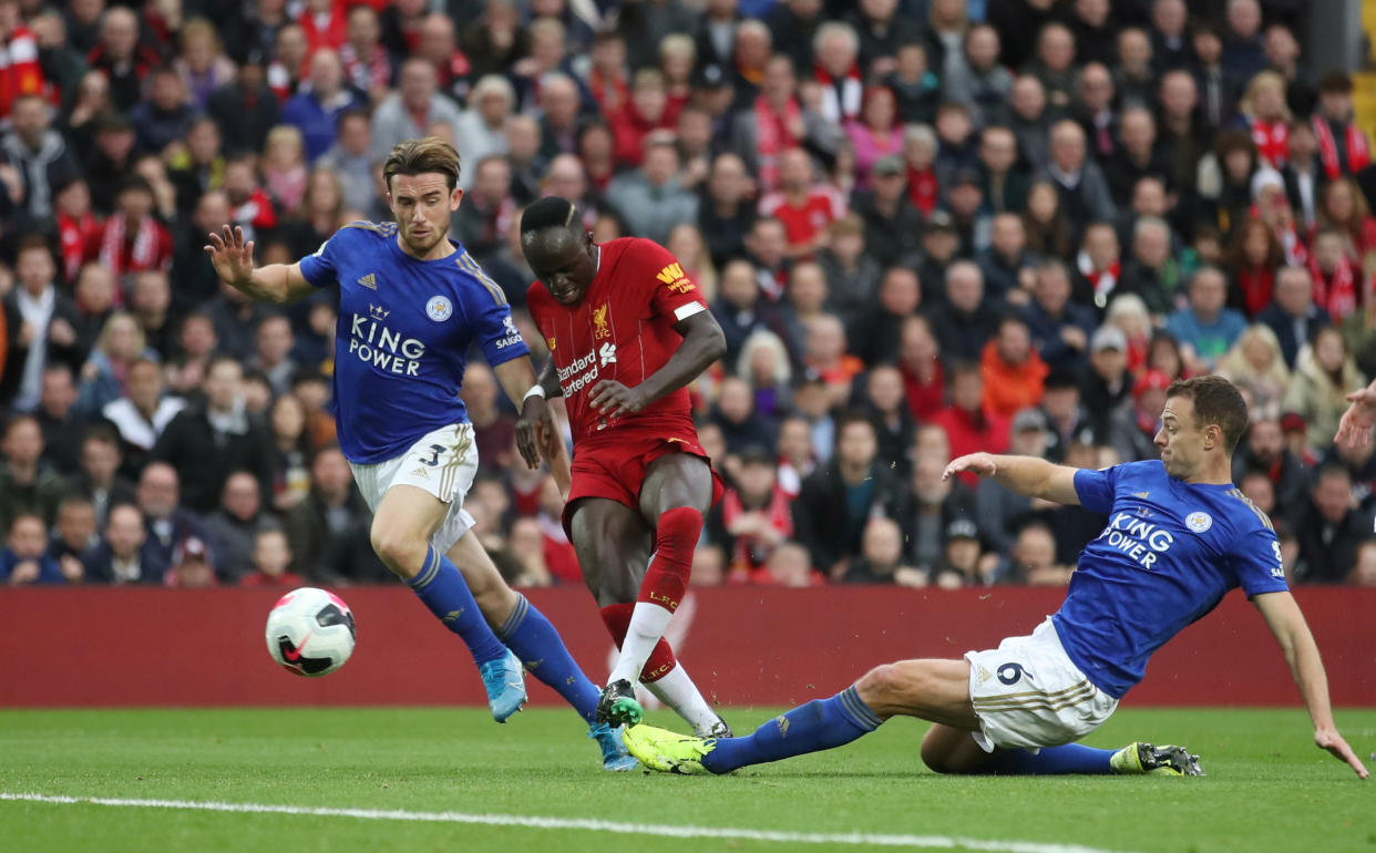 Liverpool's Sadio Mane in action with Leicester City's Jonny Evans (right) and Ben Chilwell last season.