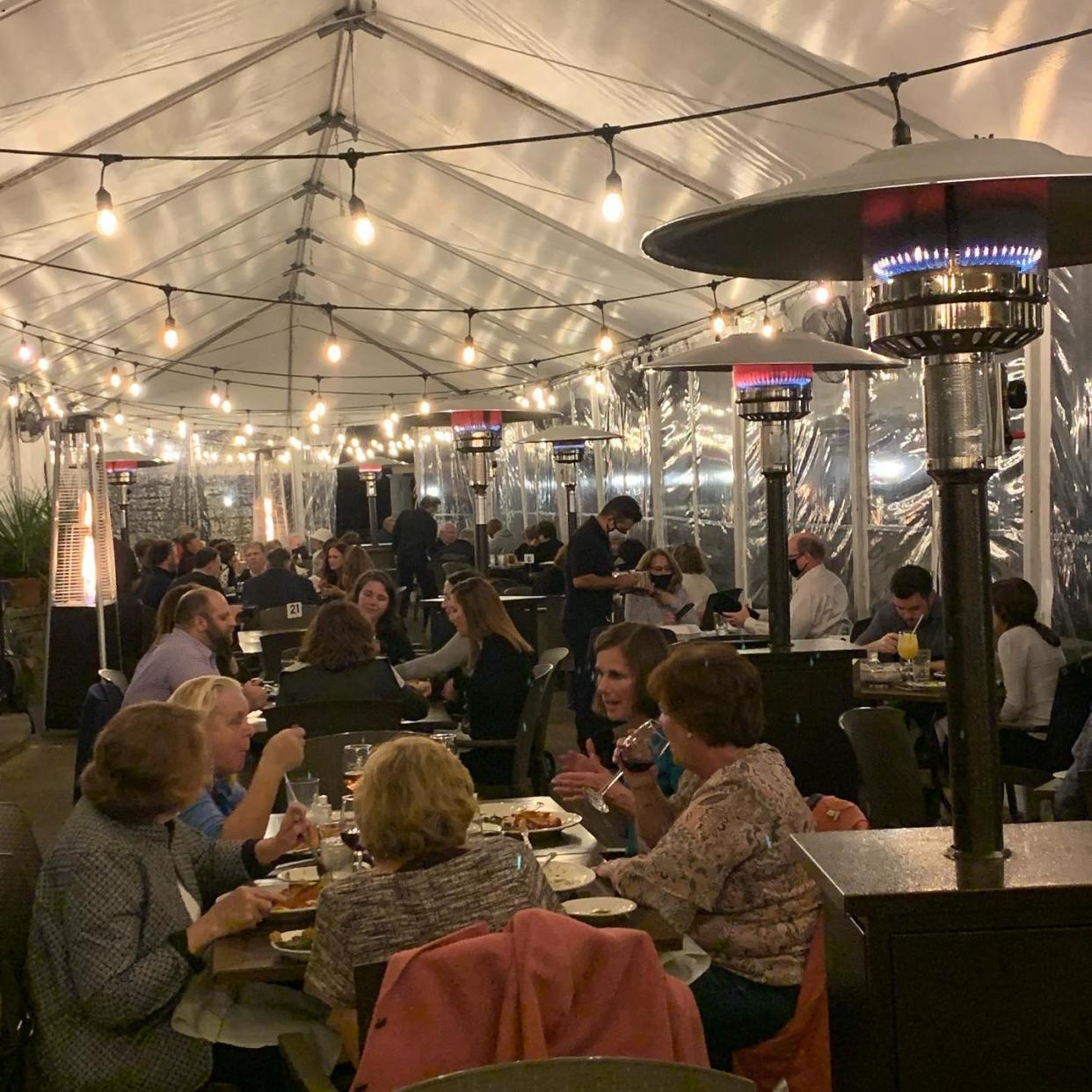 Carlucci's Waterfront Grill in Mount Laurel has a charming outdoor space for customers with nice lighting and heat lamps.