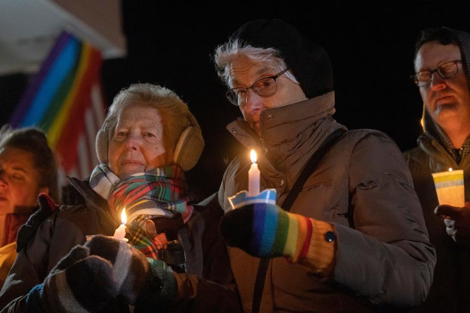 A large crowd gathered at the QSpot LGBTQ Community Center in Asbury Park for a candlelight vigil to mourn those killed and injured in the tragic shooting at Club Q in Colorado Springs.