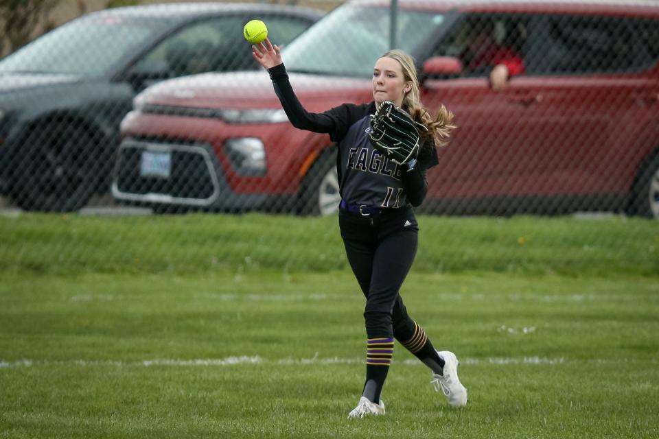 Harrisburg’s Jadyn Delahunt throws the ball toward the infield as the Harrisburg Eagles defeated the Elmira/Mapleton Falcons 17-16 in eight innings at Harrisburg High School Tuesday, April 18, 2023. 