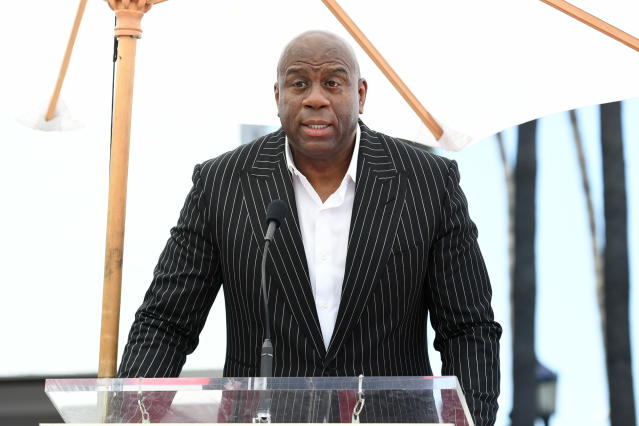 Magic Johnson joins Sixers owner Josh Harris' group in bid to buy the NFL's  Washington Commanders