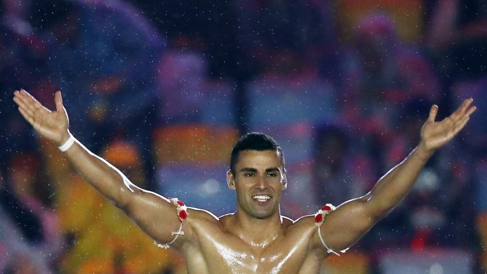 <p>And while he is certainly a sight to behold, he's not just there to look pretty and carry a flag (though those things are a plus): Taufatofua was actually there to compete. </p> <p>And he wasn't <em>trying </em>to cause an Internet thirst trap, either. He told <a href="https://www.theguardian.com/sport/2019/jan/02/the-incredible-story-of-pita-taufatofua-tongas-shirtless-olympic-flag-bearer" rel="nofollow noopener" target="_blank" data-ylk="slk:The Guardian;elm:context_link;itc:0;sec:content-canvas" class="link "><em>The Guardian</em></a> in 2019, "I was representing 1,000 years of history. We didn't have suits and ties when we traversed the Pacific Ocean."</p>