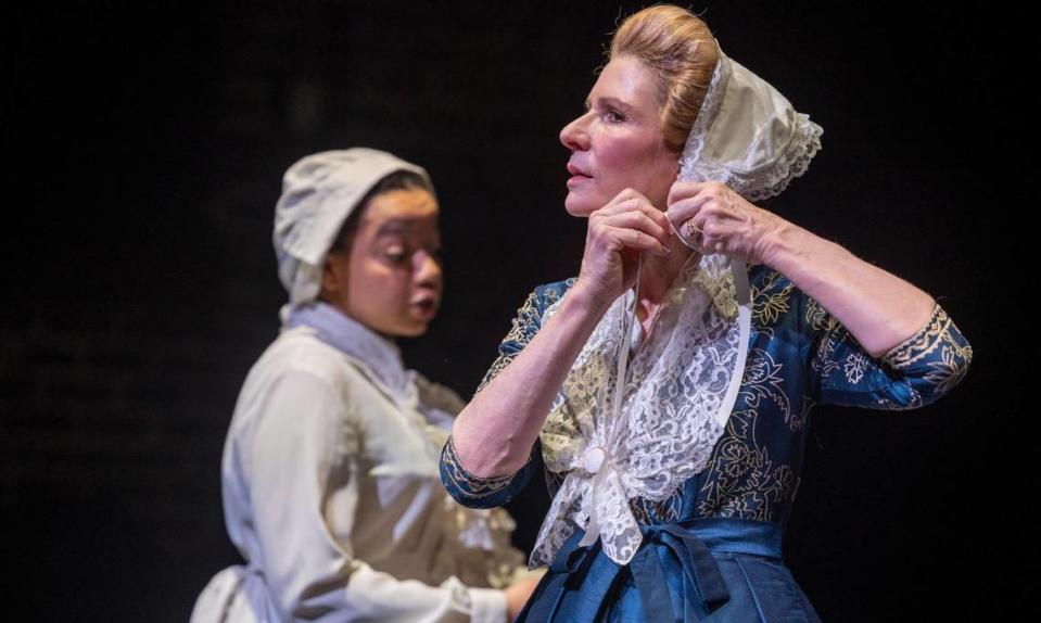 North Carolina First Lady Kristin Cooper portrays Martha Washington, in a scene with Monica Hoh who play Ona Judge during a dress rehearsal of “Ona” by Keith Burridge, on Wednesday, September 13, 2023 in Raleigh, N.C.