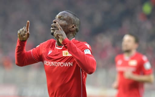 Nigerian Anthony Ujah celebrates putting Union Berlin ahead in a shock 2-0 triumph over Bundesliga leaders Borussia Moenchengladbach