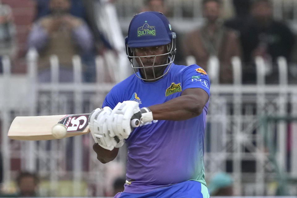 Multan Sultans' Johnson Charles plays a shot during the Pakistan Super League T20 cricket match between Islamabad United and Multan Sultans, in Rawalpindi, Pakistan, Sunday, March 10, 2024. (AP Photo/Anjum Naveed)