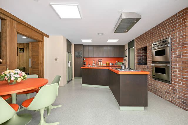 <p>Ryan Lahiff for Eklund/Gomes</p> The kitchen of the renovated "Brady Bunch" house owned by Tina Trahan