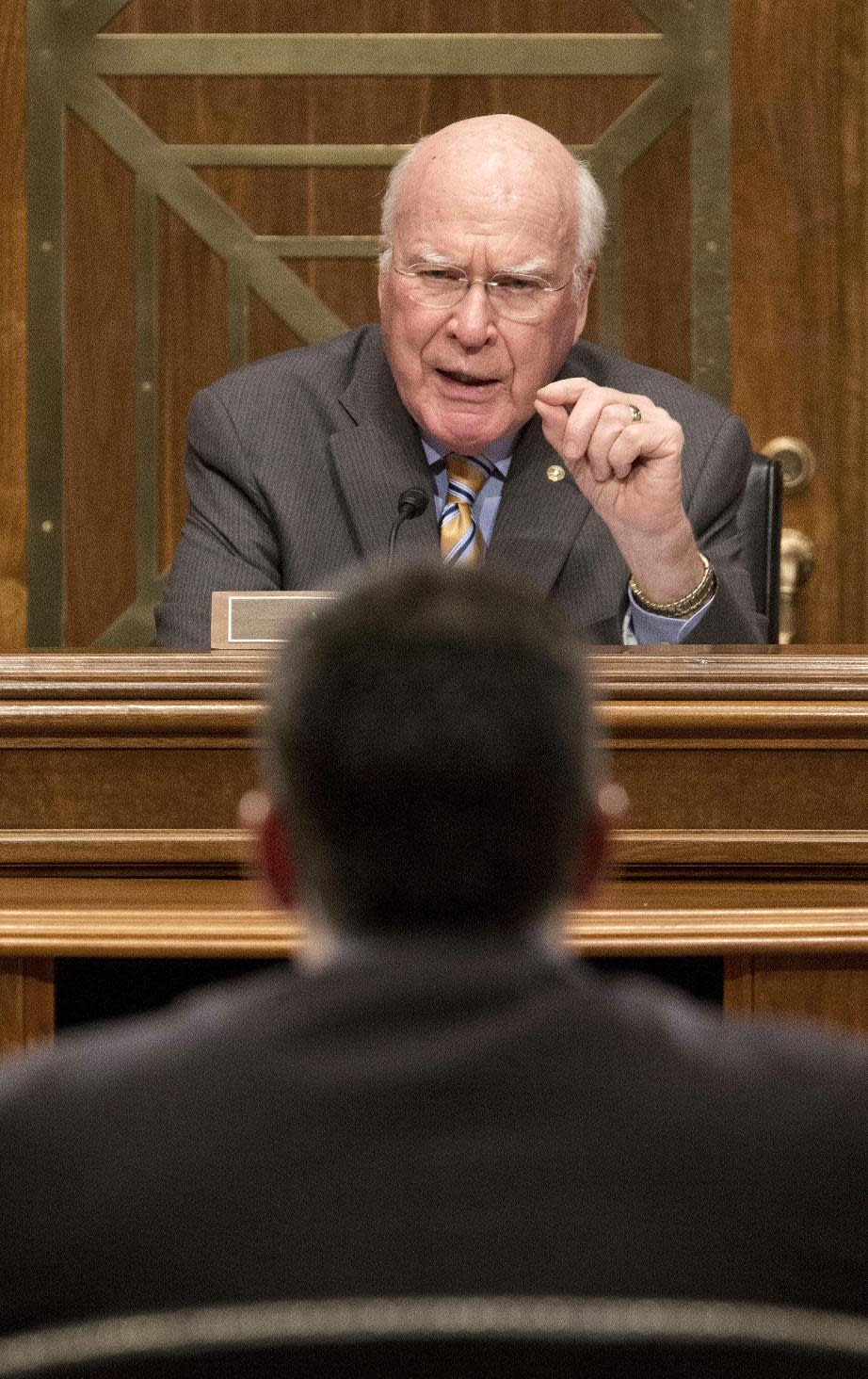 Senate subcommittee on State, Foreign Operations and Related Programs Chairman Sen. Patrick Leahy, D-VT., top, questions US Agency for International Development (USAID) Administrator Dr. Rajiv Shah, bottom, on Capitol Hill in Washington, Tuesday, April 8, 2014, during the committee's hearing of the USAID's fiscal 2015 budget. Leahy demanded to know who came up with the idea to launch a secret "Cuba Twitter" social network system. Speaking at the subcommittee hearing, Leahy called the project "cockamamie." (AP Photo/Pablo Martinez Monsivais)