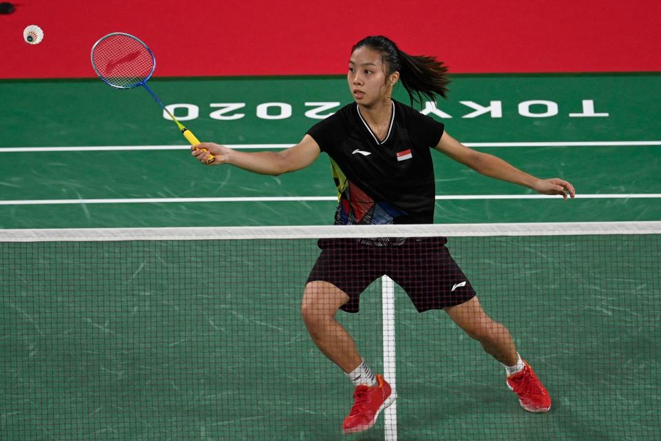 Singapore shuttler Yeo Jia Min hits a shot to South Korea's Kim Gaeun in their women's singles badminton group stage match at he Tokyo 2020 Olympic Games. 