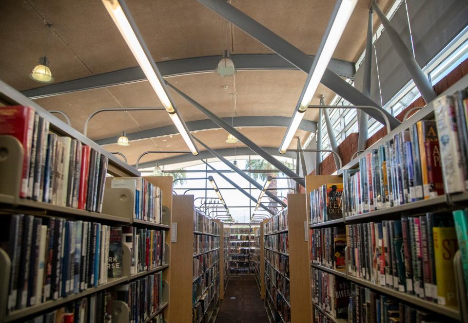 Shelves of books are seen in the Palm Desert branch library in June 2023.