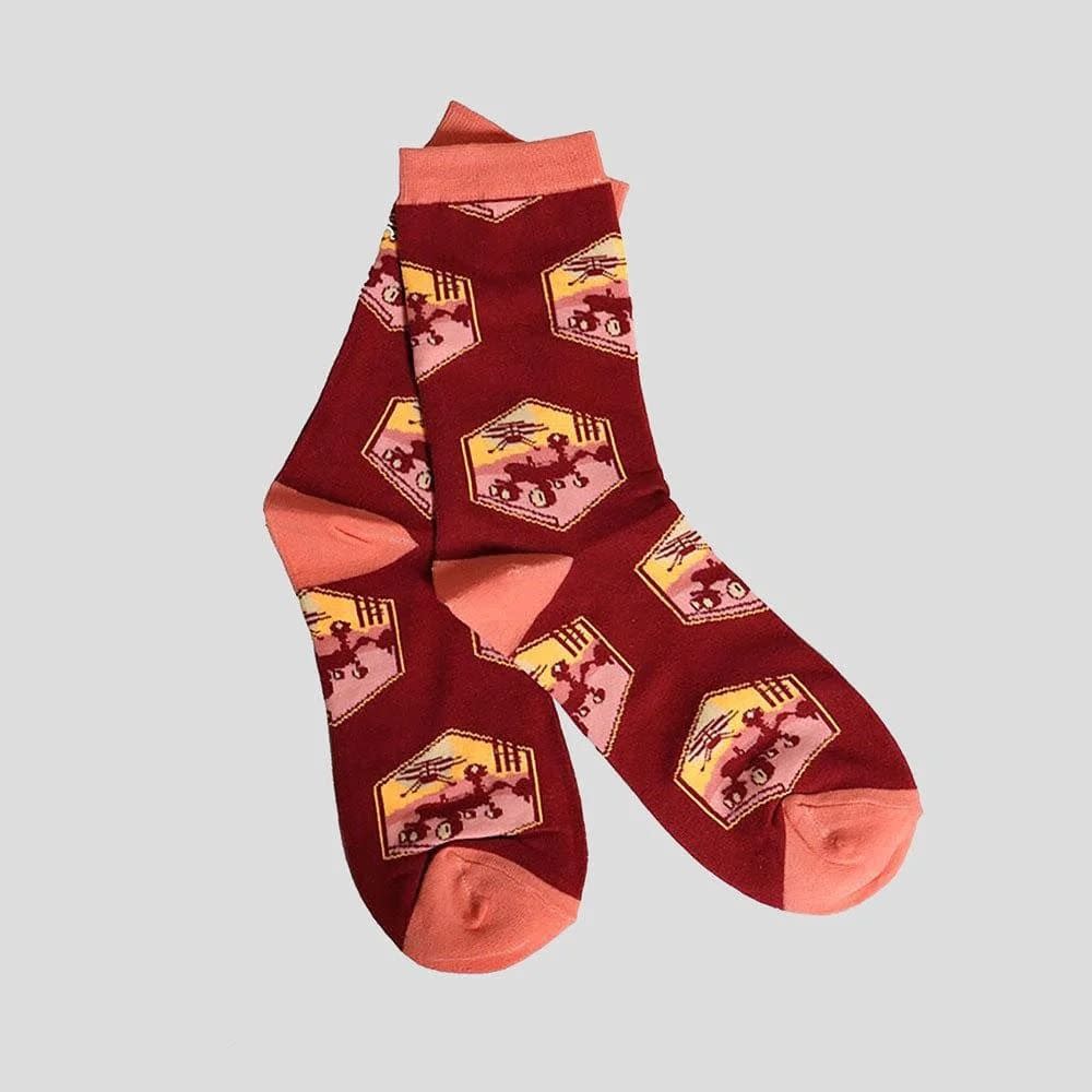 <p><a href="https://svahausa.com/products/perseverance-and-ingenuity-socks" rel="nofollow noopener" target="_blank" data-ylk="slk:Shop Now;elm:context_link;itc:0;sec:content-canvas" class="link rapid-noclick-resp">Shop Now</a></p><p>Perseverance and Ingenuity Socks</p><p>svahausa.com</p><p>$9.99</p><span class="copyright">Svaha</span>