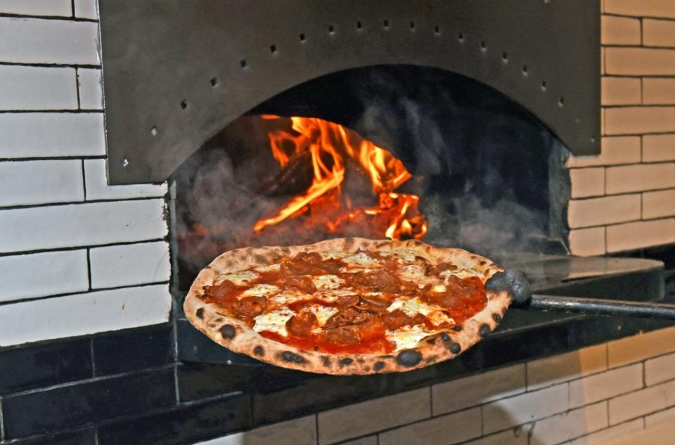 A NYC bill aims to force Big Apple pizzerias and matzah-makers to cut the smoky pollutants from their wood- and coal-fired ovens. Gregory P. Mango