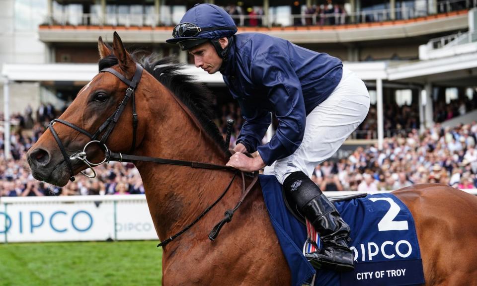 <span>City Of Troy is favourite for the Derby despite his Guineas flop when running at Newmarket, above.</span><span>Photograph: David Davies for The Jockey Club/PA</span>