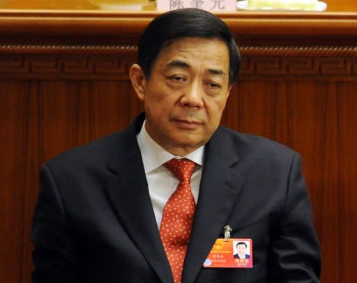 File photo shows suspended Politburo member Bo Xilai at the National People's Congress in Beijing on March 14. The Chinese government has sent a team to Hong Kong to investigate the business interests of Bo and his family, a report said Monday