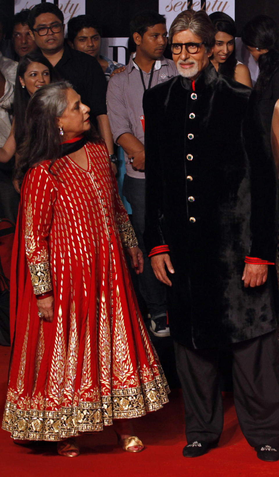 Bollywood star Amitabh Bachchan, left, and his wife Jaya Bachchan arrive for a party on the eve of his 70th birthday in Mumbai, India, Wednesday, Oct. 10, 2012. Affectionately known as "Big B," Bachchan has acted in around 180 films in a career spanning four decades in Bollywood, the home of India's prolific movie industry. (AP Photo/ Rajanish Kakade)