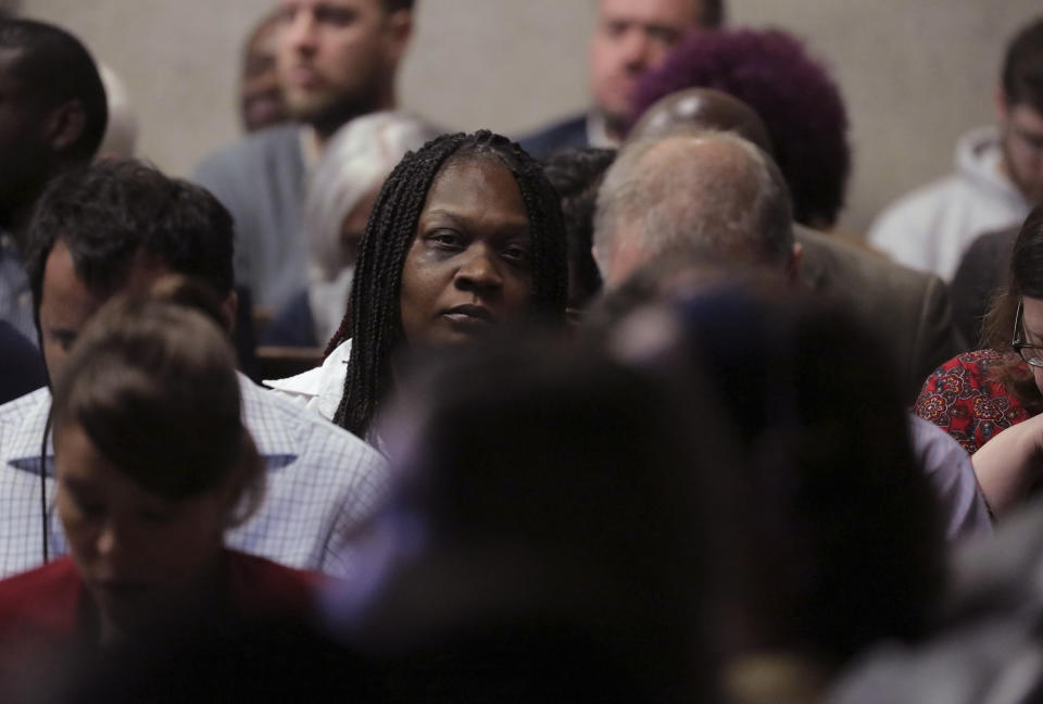 Laquan McDonald's mother, Tina Hunter listens on Tuesday, Oct. 2, 2018, during Chicago police officer Jason Van Dyke's first degree murder trial for the shooting death of her son at the Leighton Criminal Court Building in Chicago. (Antonio Perez/ Chicago Tribune via AP, Pool)