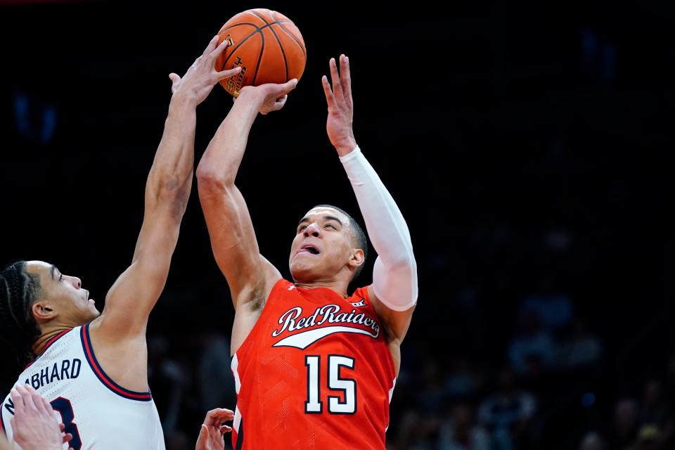 Texas Tech guard Kevin McCullar (15) has his shot blocked by Gonzaga guard Andrew Nembhard, left, during the second half of an NCAA college basketball game at the Jerry Colangelo Classic Saturday, Dec. 18, 2021, in Phoenix. Gonzaga won 69-55. (AP Photo/Ross D. Franklin) ORG XMIT: PNU119