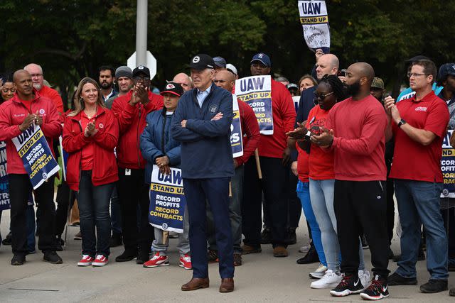 <p>JIM WATSON/AFP via Getty</p> US President Joe Biden joins striking members of the United Auto Workers (UAW) union at a picket line outside a General Motors Service Parts Operations plant in Belleville, Michigan, on September 26, 2023