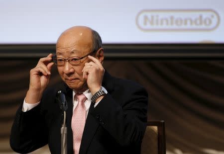 Nintendo Co Chief Executive Tatsumi Kimishima adjusts his glasses during a news conference in Tokyo, Japan, October 29, 2015. REUTERS/Toru Hanai