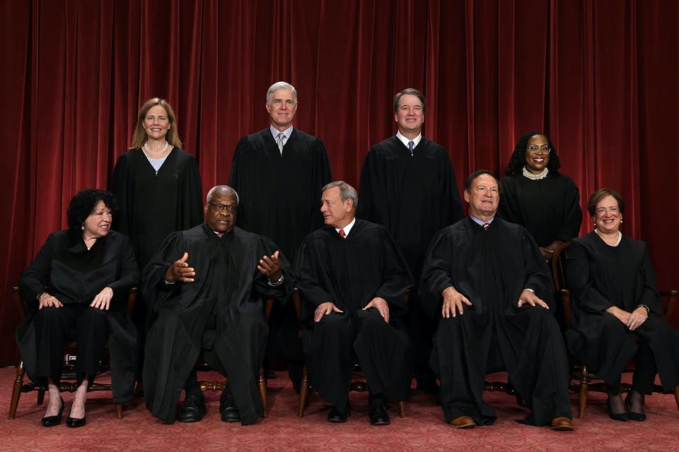 The Supreme Court, from left in front row: Sonia Sotomayor, Clarence Thomas, <span class="caas-xray-inline-tooltip"><span class="caas-xray-inline caas-xray-entity caas-xray-pill rapid-nonanchor-lt" data-entity-id="John_Roberts" data-ylk="cid:John_Roberts;pos:2;elmt:wiki;sec:pill-inline-entity;elm:pill-inline-text;itc:1;cat:Judge;" tabindex="0" aria-haspopup="dialog"><a href="https://search.yahoo.com/search?p=John%20Roberts" data-i13n="cid:John_Roberts;pos:2;elmt:wiki;sec:pill-inline-entity;elm:pill-inline-text;itc:1;cat:Judge;" tabindex="-1" data-ylk="slk:Chief Justice John Roberts;cid:John_Roberts;pos:2;elmt:wiki;sec:pill-inline-entity;elm:pill-inline-text;itc:1;cat:Judge;" class="link ">Chief Justice John Roberts</a></span></span>, Samuel Alito and Elena Kagan; and from left in back row: Amy Coney Barrett, Neil Gorsuch, Brett Kavanaugh and Ketanji Brown Jackson. <a href="https://www.gettyimages.com/detail/news-photo/united-states-supreme-court-associate-justice-sonia-news-photo/1431388794?phrase=us%20supreme%20clarence%20thomas&adppopup=true" rel="nofollow noopener" target="_blank" data-ylk="slk:Alex Wong/Getty Images;elm:context_link;itc:0;sec:content-canvas" class="link ">Alex Wong/Getty Images</a>