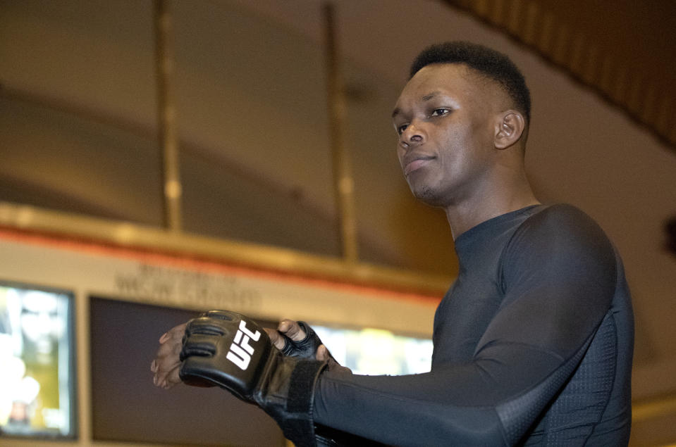UFC middleweight champion Israel Adesanya, of Nigeria, prepares for a UFC 248 open workout, in Las Vegas on Wednesday, March 4, 2020. (Steve Marcus/Las Vegas Sun via AP)