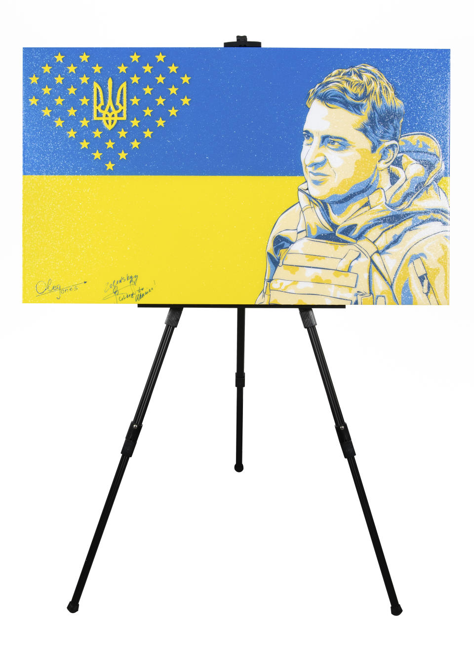 This March 9, 2023, photo provided by RR Auction shows a painting by American artist Oleg Jones of Ukrainian President Volodymyr Zelenskyy that was signed by Zelenskyy. The painting is being sold at auction, which will conclude April 12, 2023, and proceeds from the sale will be used to benefit the nation's people suffering during its war with Russia. (Nikki Brickett/RR Auction via AP)