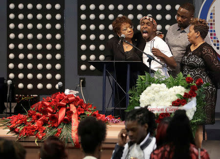 Stevante Clark (C), speaks during the funeral services for Stephon Clark at Bayside Of South Sacramento Church in Sacramento, California, U.S., March 29, 2018. Jeff Chiu/Pool via Reuters