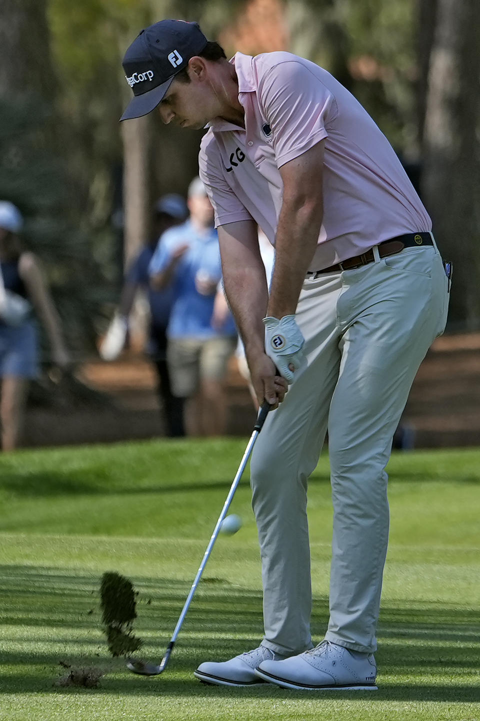 J.T. Poston hits from the 10th fairway during the second round of The Players Championship golf tournament Friday, March 15, 2024, in Ponte Vedra Beach, Fla. (AP Photo/Marta Lavandier)