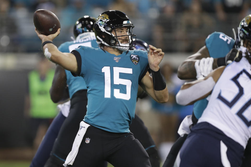 Jacksonville Jaguars quarterback Gardner Minshew II (15) throws a pass against the Tennessee Titans during the first half of an NFL football game Thursday, Sept. 19, 2019, in Jacksonville, Fla. (AP Photo/Chris O'Meara)