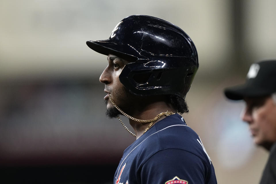 Atlanta Braves' Ozzie Albies watches after a single during the second inning of Game 1 in baseball's World Series between the Houston Astros and the Atlanta Braves Tuesday, Oct. 26, 2021, in Houston. (AP Photo/David J. Phillip)