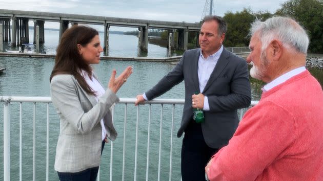 Rep. Nancy Mace (R-S.C.), left, discusses infrastructure issues with Hilton Head Island Town Manager Marc Orlando, center, and Mayor John McCann. McCann said he plans to vote for her. (Photo: Daniel Marans/HuffPost)