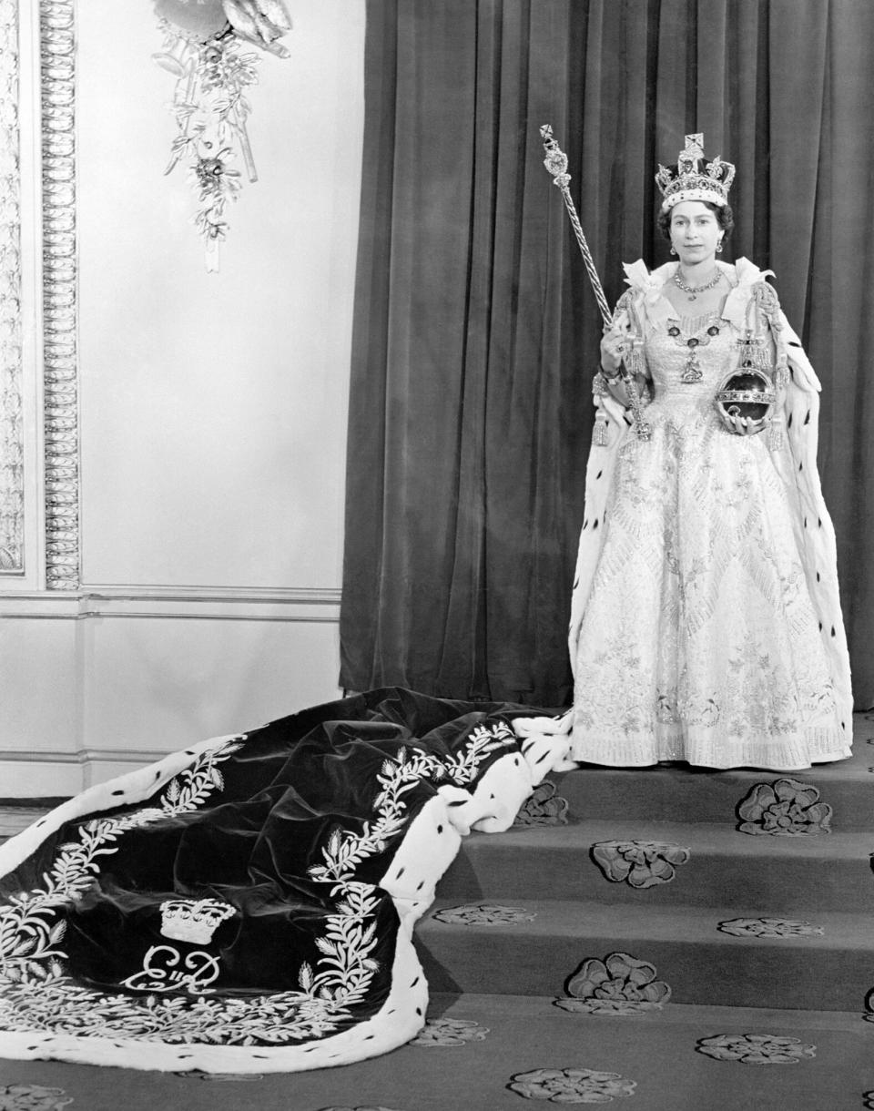 Queen Elizabeth II wearing the in the Throne room at Buckingham Palace, after her Coronation in Westminster Abbey. (Photo by PA Images