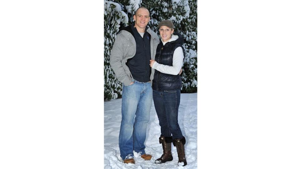 Zara Phillips, daughter of Princess Anne, and grand-daughter of Britain's Queen Elizabeth II, shows the photographer her engagement ring as she poses for a photograph with her fiance, England rugby player Mike Tindall (not pictured), after the announcement of their engagement, at their home in Gloucestershire, south west England on December 21, 2010.  Queen Elizabeth II's eldest grand-daughter Zara Phillips is to wed her rugby-playing boyfriend Mike Tindall, Buckingham Palace announced Tuesday, in a marriage of world-beating sports stars.  Setting up the prospect of two royal weddings in 2011, the announcement comes a month after her cousin Prince William, the second in line to the throne, revealed his engagement to university sweetheart Kate Middleton.                AFP PHOTO / Tim Ireland / Pool (Photo credit should read Tim Ireland/AFP via Getty Images)