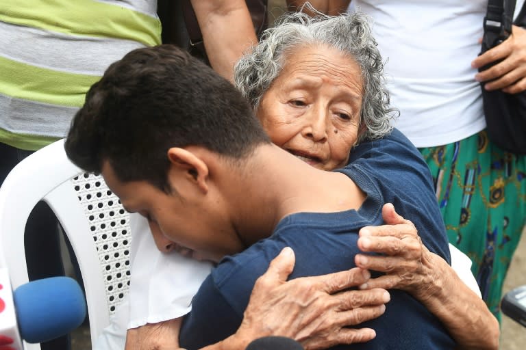 A Nicaraguan man arrested in recent protests is embraced by a relative after being released from jail in Managua, after intervention by Catholic bishops