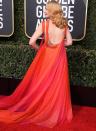 in an orange-ombre Georges Chakra gown to the Golden Globe Awards.