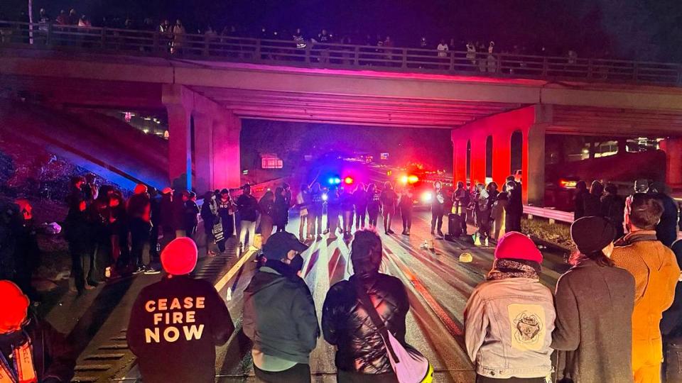 Protesters against the Israel-Gaza War have blocked two lanes of the Durham Freeway Thursday evening, Nov. 2, 2023.