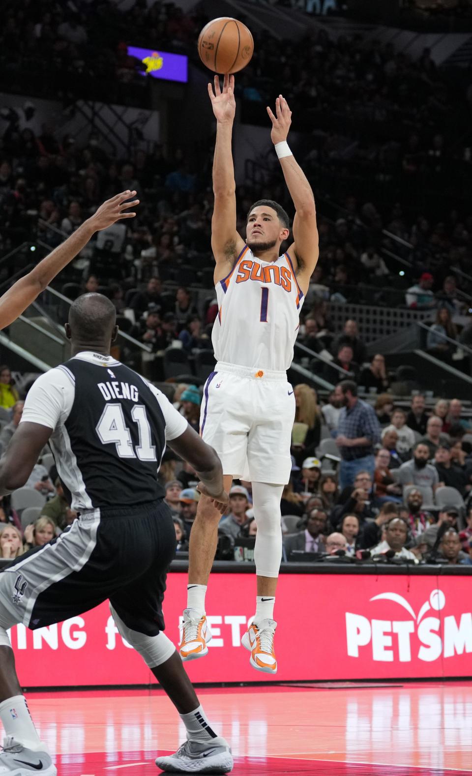 Dec 4, 2022; San Antonio, Texas, USA;  Phoenix Suns guard Devin Booker (1) shoots in the first half against the San Antonio Spurs at the AT&T Center. Mandatory Credit: Daniel Dunn-USA TODAY Sports